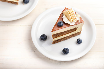 slice of cake in layers of cream