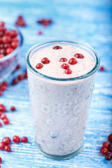 yogurt with cranberries on the table
