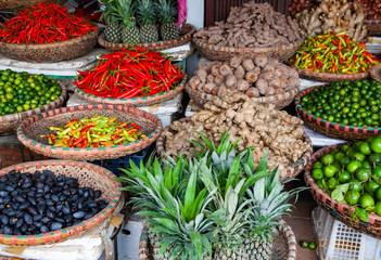 tropical spices and fruits sold at a local market in Hanoi (Vietnam)