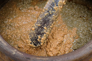 salted soybean paste in jar. soy miso production