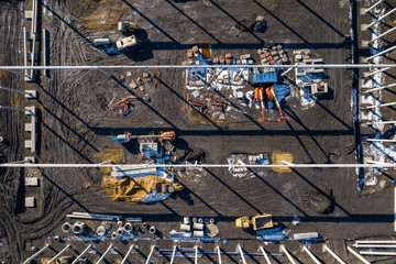 Aerial view. Construction site shot from above. Industrial place. Photo captured with drone.