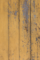 Yellow texture of old painted wooden boards for background and design. Yellow paint.