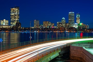 Long exposure of Boston skyline at night with charles river and memorial drive