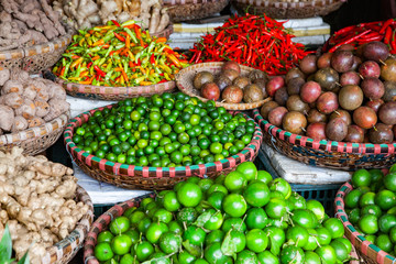 tropical spices and fruits sold at a local market in Hanoi (Vietnam)