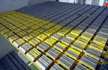 embossed metal surface of small cells with yellow paint