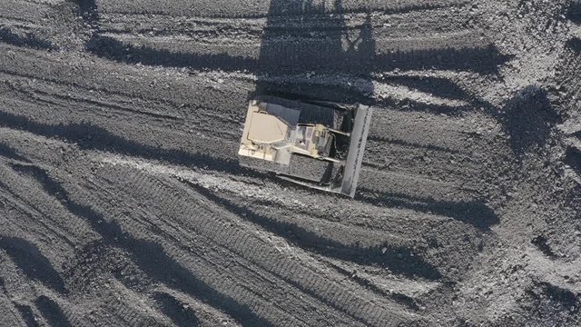 Open pit mine. Aerial view of extractive industry for coal. Top view. Photo captured with drone. DJI Mavic 2 Pro 4k dlog-m ungraded flat.