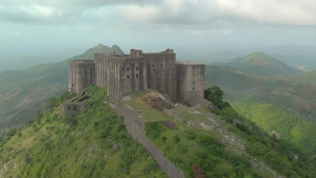Aerial Descending: People Exploring the Front Castle of Citadel Laferriere