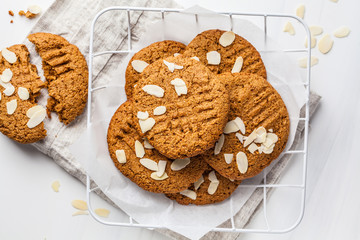 Homemade almond cookies on a white background, top view.
