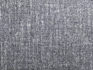 The textured gray natural fabric. 