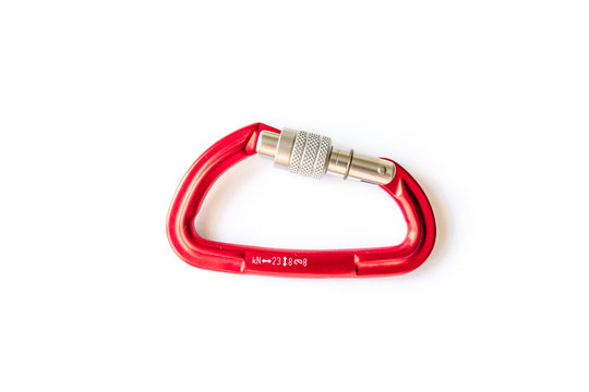 Red screwgate carabiner locked up, isolated on white background. Centered closeup of locking binner done up. Essential climbing gear.