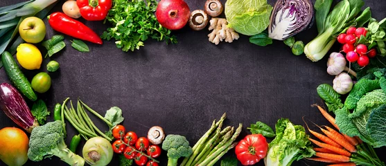 Fotobehang Healthy food concept with fresh vegetables and ingredients for cooking © Alexander Raths