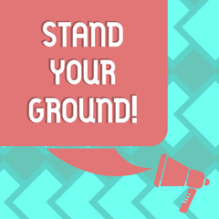Text sign showing Stand Your Ground. Conceptual photo maintain ones position typically in face of opposition Color Silhouette of Blank Square Speech Bubble and Megaphone photo