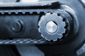 Driving pulley and toothed belt close up