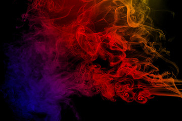 Naklejka na ściany i meble Abstract color smoke on black background. Abstract Color smoke clouds.