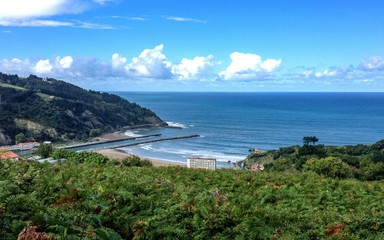 Beautiful sunny landscape of Basque Country over the beach of Deba, Pais Basco, Spain