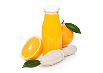 Fresh raw peeled oranges with hand juice squeezer