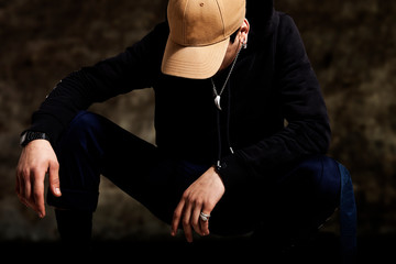 portrait of young rapper in the studio