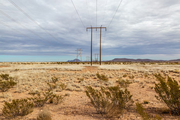 Fototapeta na wymiar Electricity Pylons in Rural New Mexico