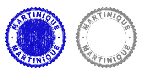 Grunge MARTINIQUE stamp seals isolated on a white background. Rosette seals with grunge texture in blue and grey colors. Vector rubber stamp imitation of MARTINIQUE title inside round rosette.
