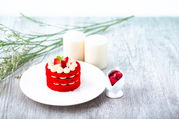 Red Velvet homemade cake decorated with cream.