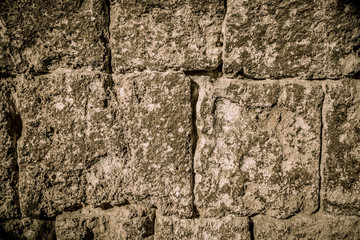 The old stone walls. Stone wall. The backdrop of ancient walls. San Gimignano. Italy.