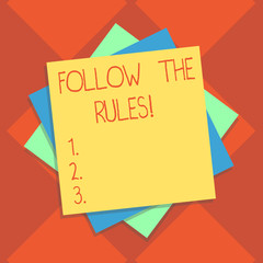 Handwriting text writing Follow The Rules. Concept meaning act in agreement or compliance with obey them Firmly Multiple Layer of Blank Sheets Color Paper Cardboard photo with Shadow