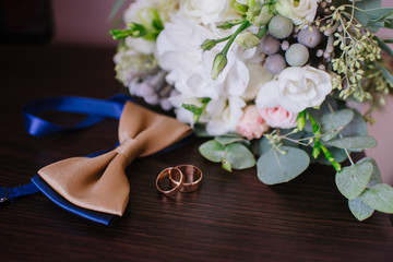 Fototapeta na wymiar Grooms accessories for preparation on wedding day, shoes, rings and bouquet