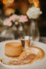 Baked cheesecake dulce de leche, homemade cake, concept of baking, desserts and food.