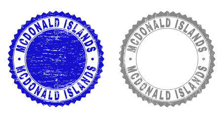 Grunge MCDONALD ISLANDS stamp seals isolated on a white background. Rosette seals with grunge texture in blue and grey colors.