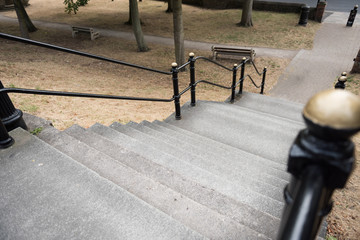 An empty French style paris style flight of stairs, with a steel metal handrail. beautiful victorian architecture, perfect for composites. compositing.