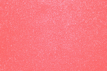 Sparkling background made of Living Coral 2019 color. Color of year 2019 backdrop for holidays and parties. coy2019 Living Coral concept.