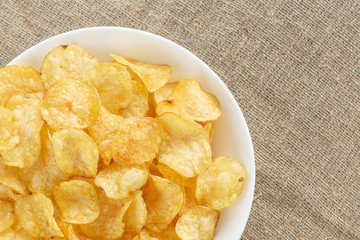 Delicious potato chips with salt