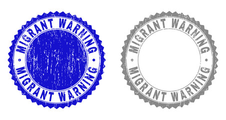 Grunge MIGRANT WARNING stamp seals isolated on a white background. Rosette seals with grunge texture in blue and grey colors.