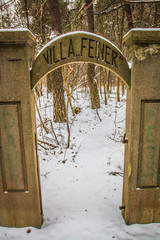 An old gate with inscription 'Villa Feiner' leading to what used to be a Villa before II World War
