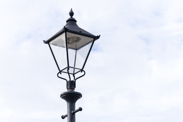 Fototapeta na wymiar Street lamp on sky background Albert Dock Liverpool