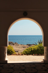 Scenic landscape visible by arch, Mediterranean mood 