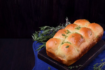 Golden pampushki with herbs and garlic. Ukrainian cuisine buns