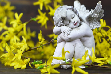  Guardian angel and yellow forsythia flowers