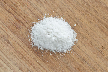 Fototapeta na wymiar Salt on a wooden table