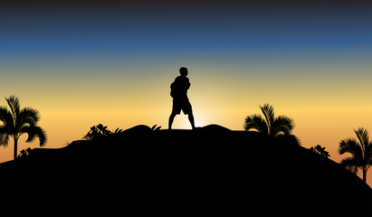 silhouette of a man on top of mountain
