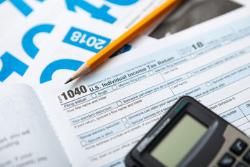 Obraz premium United States 1040 Tax Forms With Calculator For 2018 2019 Season