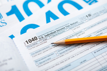 Obraz premium United States 1040 Tax Forms With Pencil For 2018 2019 Season