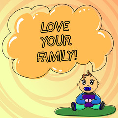Writing note showing Love Your Family. Business photo showcasing willingness of each member to sacrifice anything for them Baby Sitting on Rug with Pacifier Book and Cloud Speech Bubble