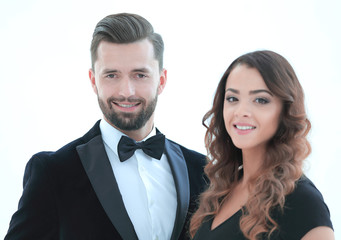 Portrait of a handsome man looking at the camera with a woman