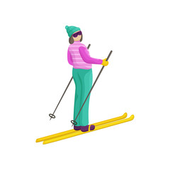 A young woman in a bright ski suit wants descend from the mountain