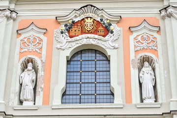 Statues and facade of old Church of St. Catherine, Vilnius, Lithuania.