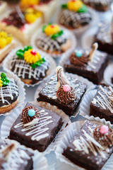 Assortment of pieces of cake on table, copy space. Several slices of delicious desserts, restaurant menu concept