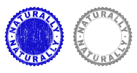 Grunge NATURALLY stamp seals isolated on a white background. Rosette seals with grunge texture in blue and grey colors. Vector rubber stamp imitation of NATURALLY caption inside round rosette.
