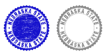 Grunge NEBRASKA STATE stamp seals isolated on a white background. Rosette seals with grunge texture in blue and gray colors. Vector rubber stamp imprint of NEBRASKA STATE tag inside round rosette.