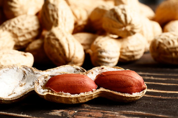  peanuts on a wooden table. Place for text. Top view. close-up